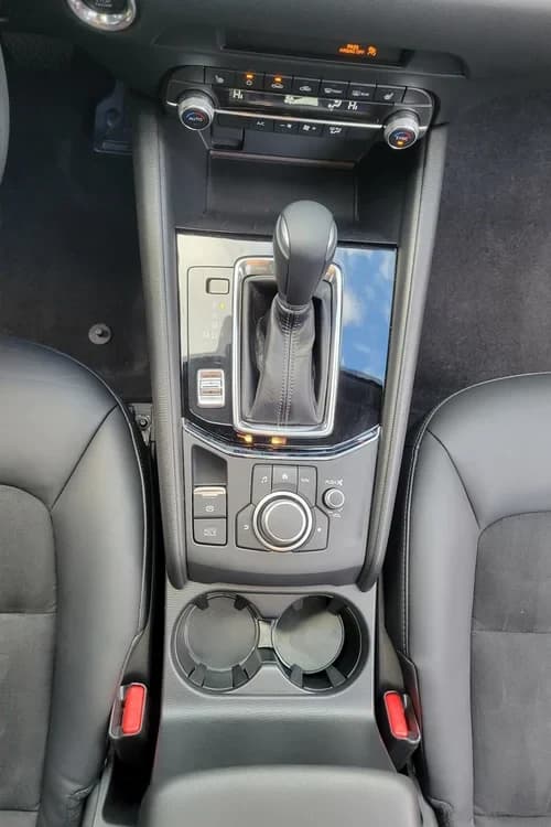 Same Mazda CX-5 center console clean after detailing