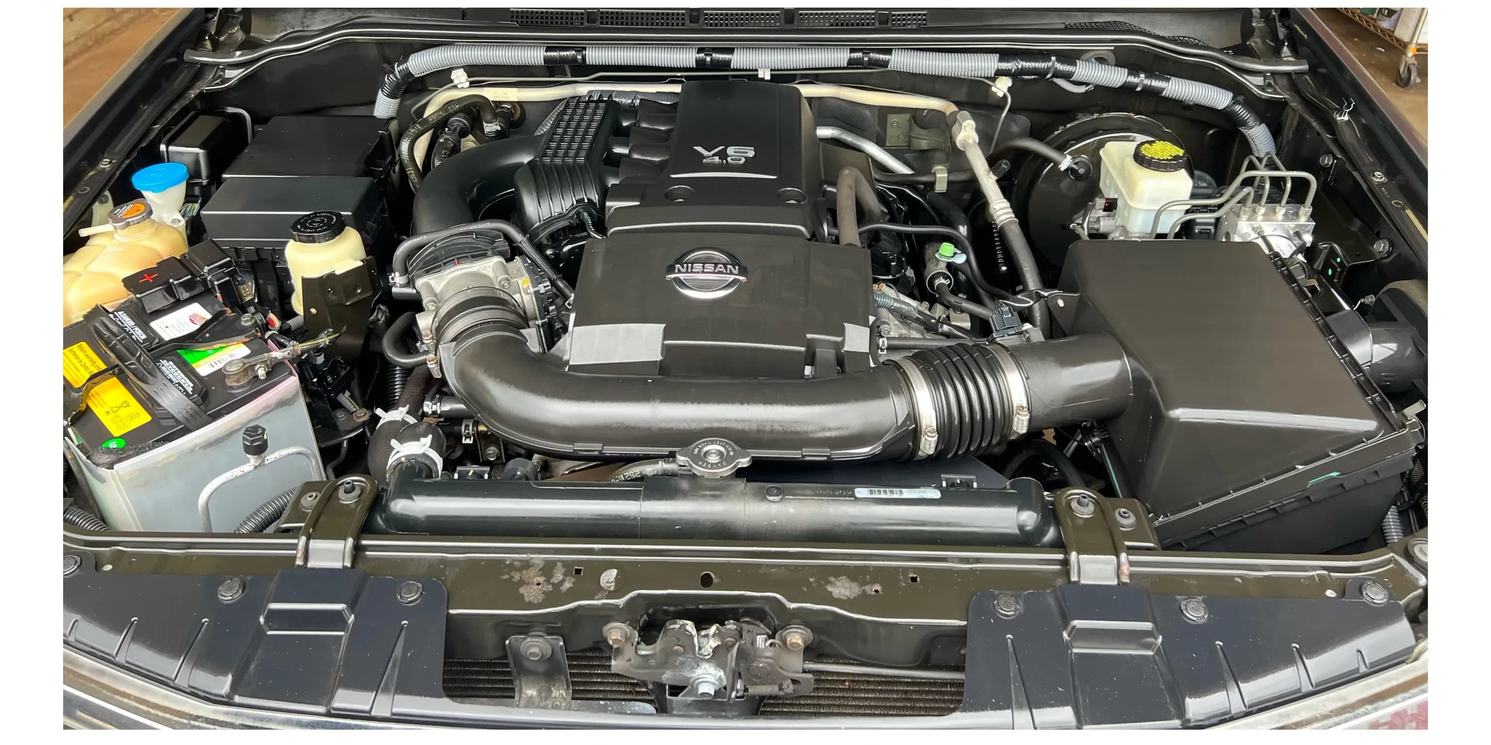 Same Nissan Frontier engine bay after specialty cleaning
