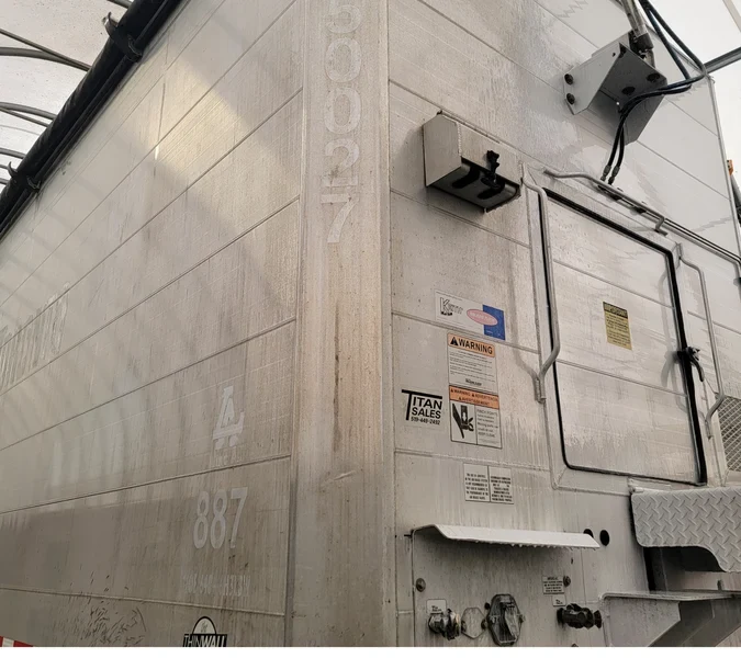 Commercial trailer exterior before washing with visible road film and surface grime